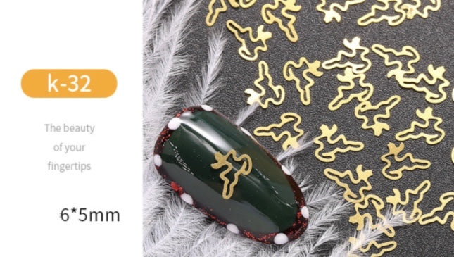 GOLD METAL CUTOUT CHRISTMAS NAIL DECOR